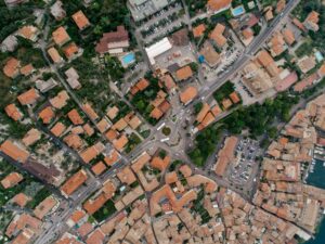 Stunning high-angle aerial photo showcasing a European city's intricate street layout and architecture.